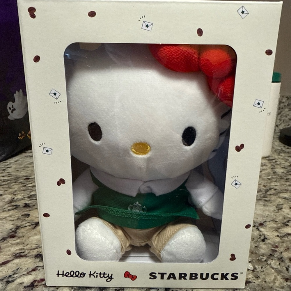 Starbucks Hello Kitty Plush with Red Bow and Green Apron